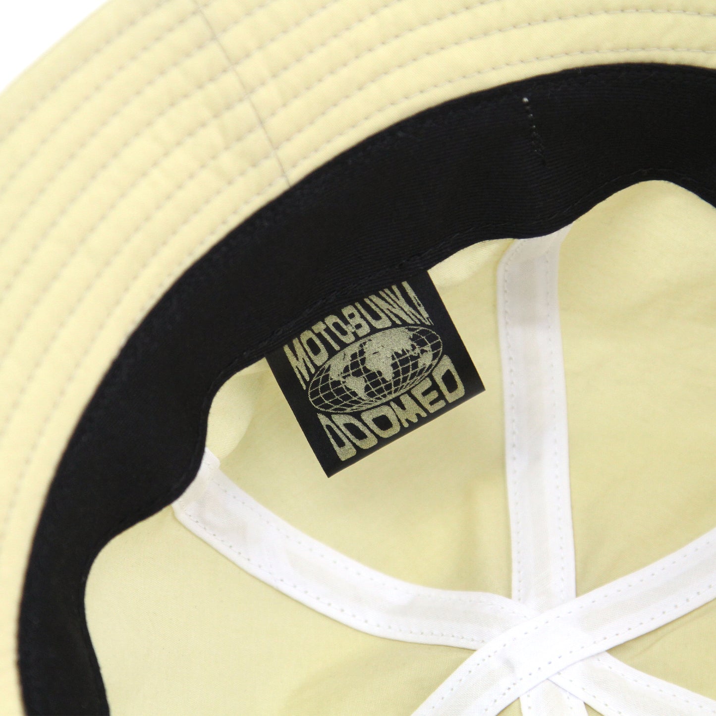 MOTO-BUNKA X DOOMED - Web Cross Bucket Hat/Cream